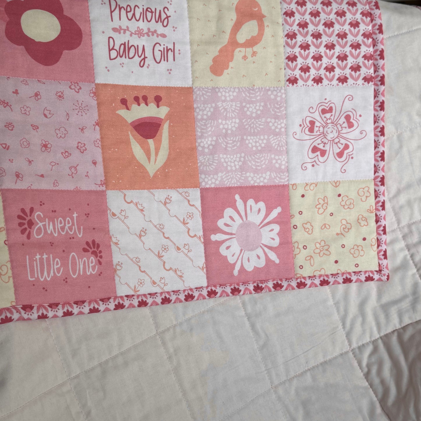 Quilt binding has mitered corners